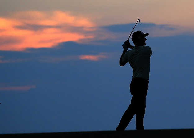 Golf Player at Sunset